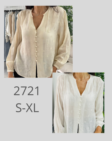 Blusa blanca con botones y mangas largas, disponible en tallas S-XL.